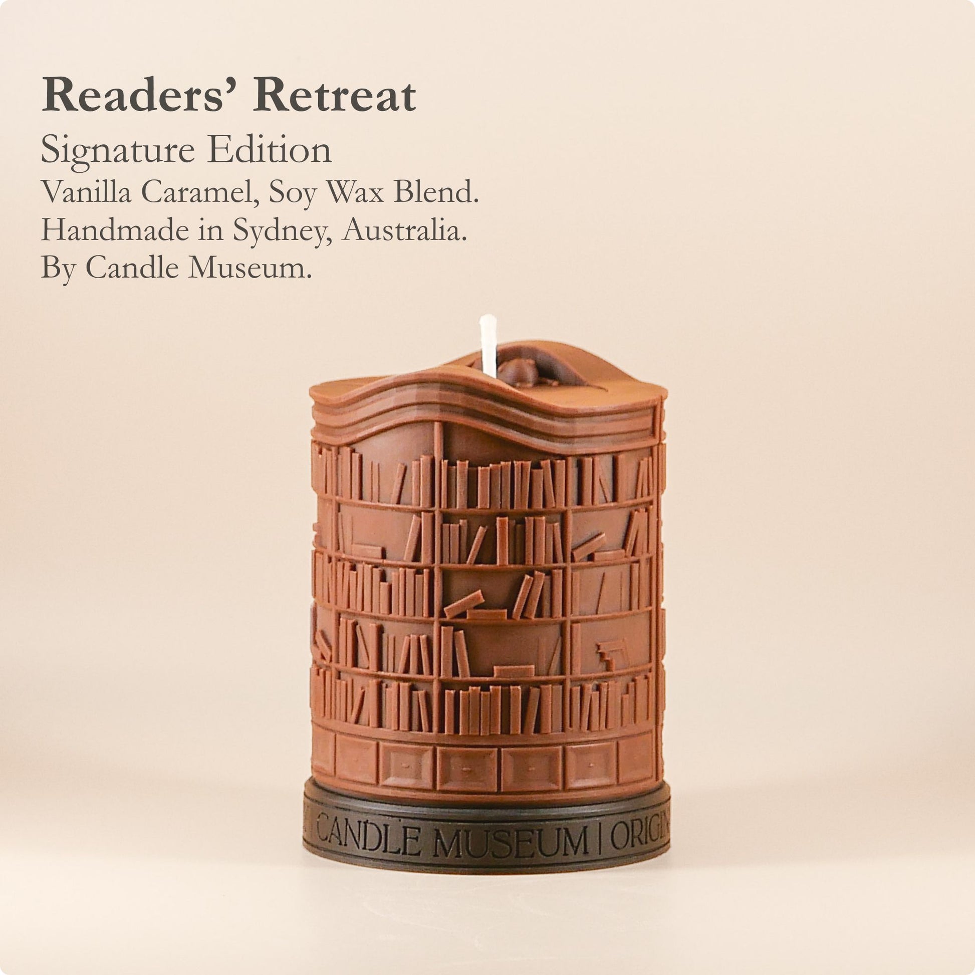 Candle shaped like a bookshelf with 'Candle Museum' branding on a beige background