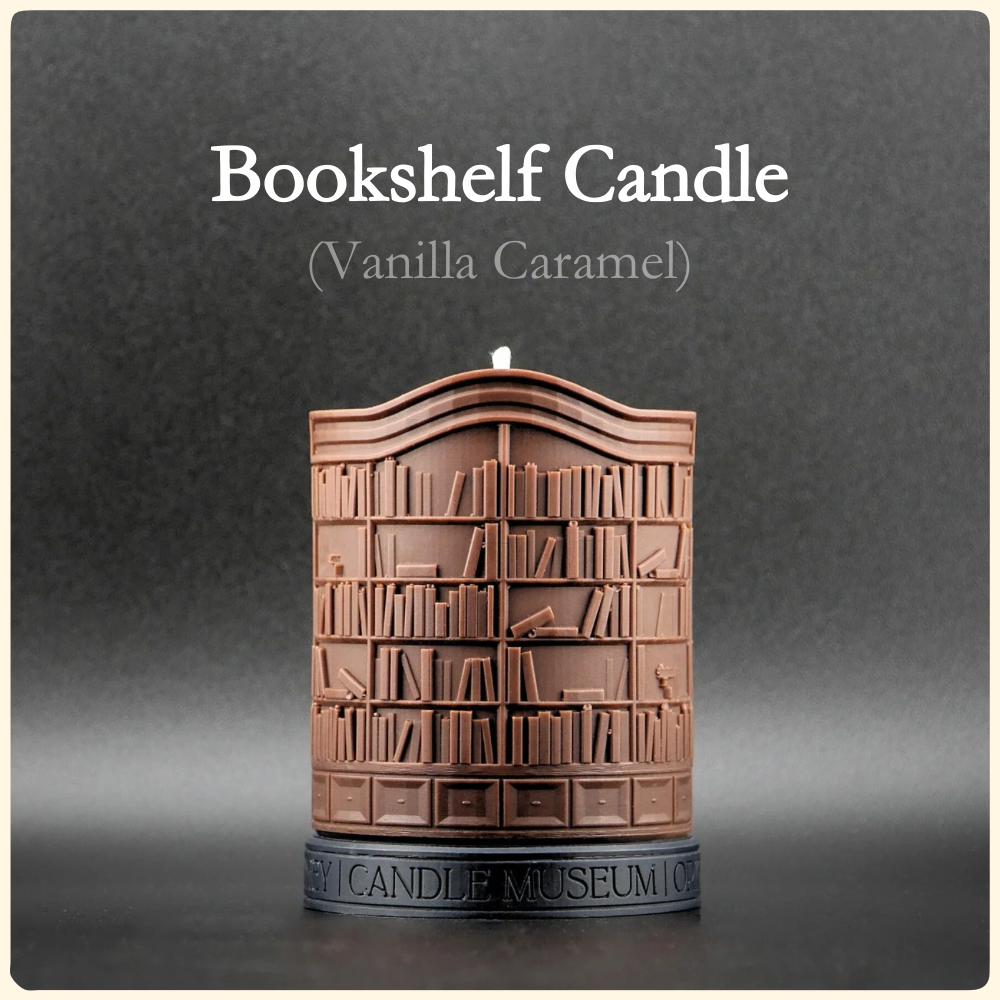 Bookshelf candle with 'Vanilla Caramel' scent on a gray background