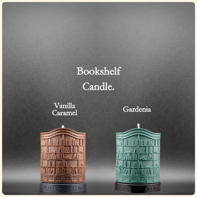 Two bookshelf-shaped candles, one vanilla caramel and one gardenia, on a gray background.